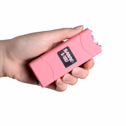 SABRE 2-IN-1 STUN GUN WITH FLASHLIGHT & BELT HOLSTER, 2.762 MICROCOULOMBS (?C) CHARGE, 120 LUMENS PINK - Image 1
